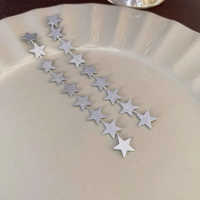 AROS DE FIESTA CON DISEÑO DE ESTRELLAS EN ALEACION - 2