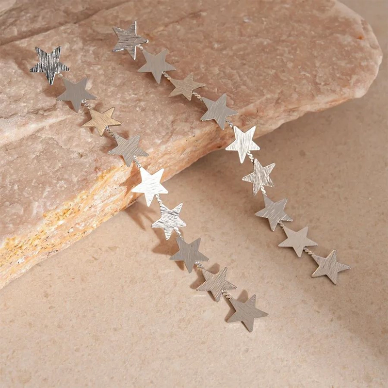AROS DE FIESTA CON DISEÑO DE ESTRELLAS EN ALEACION - 3