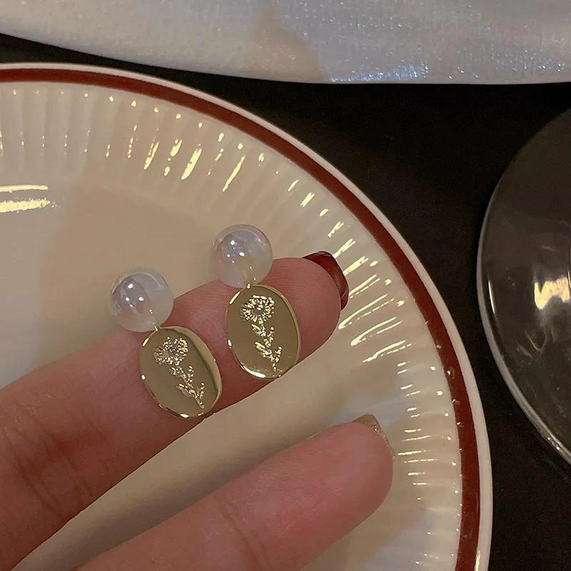 AROS DE FIESTA EN FORMA DE FLOR CON BASTAGO DE PLATA - 3