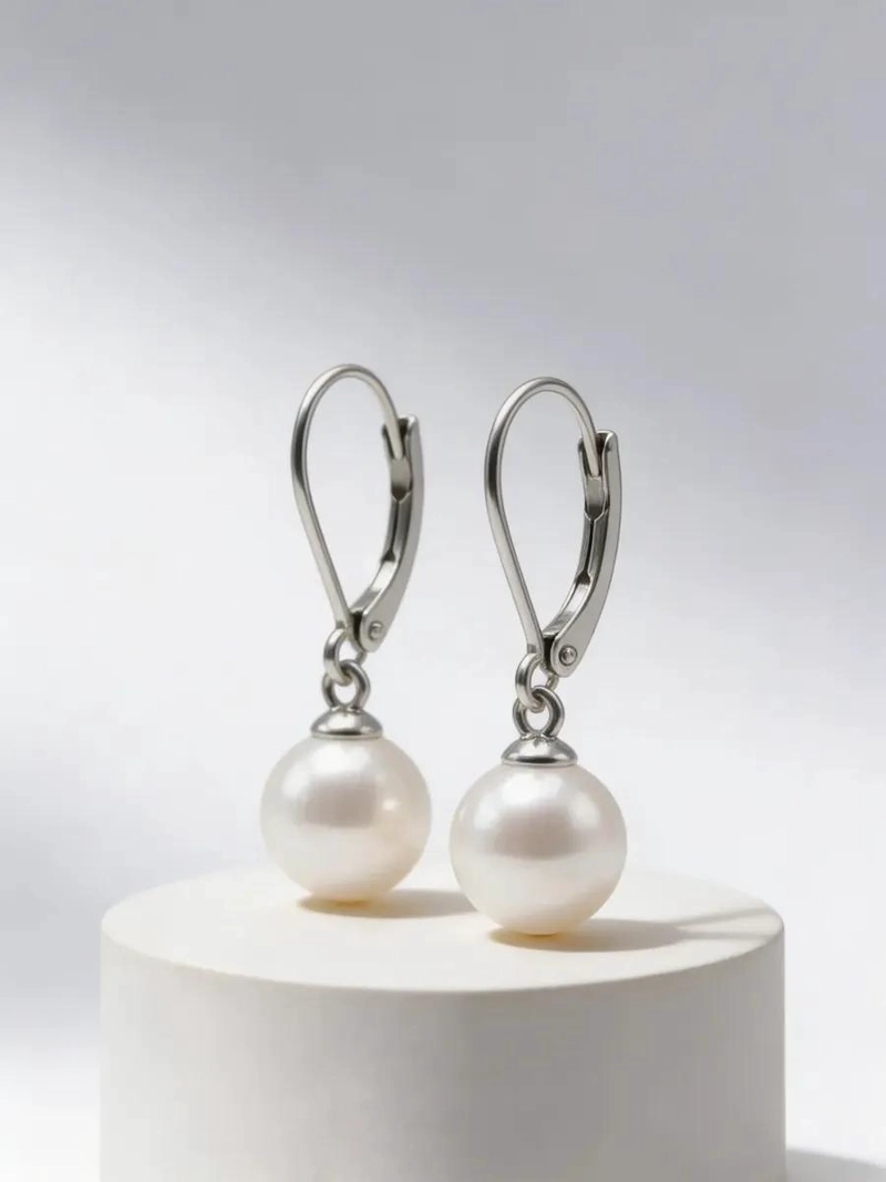 AROS ELEGANTES DE ACERO INOXIDABLE CON PERLAS COLGANTES - 1
