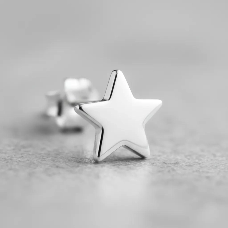 ZARCILLOS MINIMALISTAS ESTRELLA EN PLATA 925 HIPOALERGE NICOS - 1