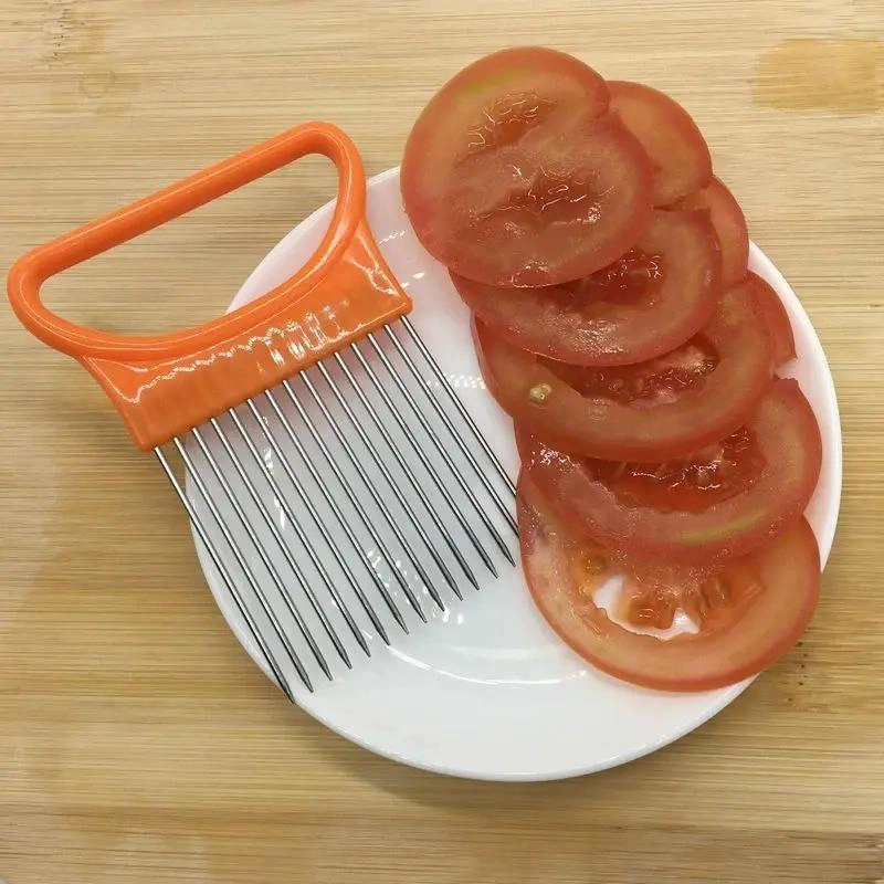 SUJETADOR DE ACERO INOXIDABLE PARA CORTAR FRUTAS Y VERDURAS - 2