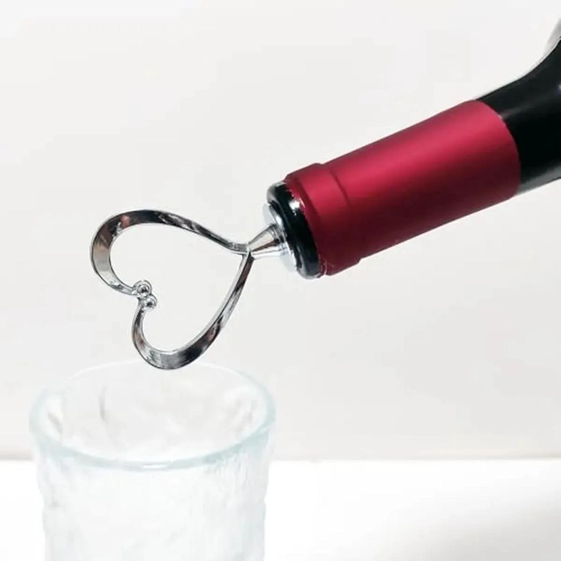 TAPONES DECORATIVOS PARA BOTELLA EN FORMA DE CORAZON PACK DE 4 - 5