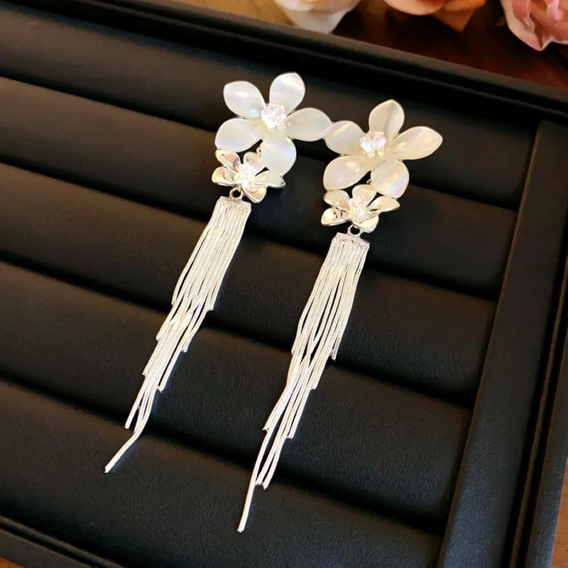 AROS DE FIESTA CON DISEÑO FLORAL EN ALEACION HIPOALERGE NICA - 3