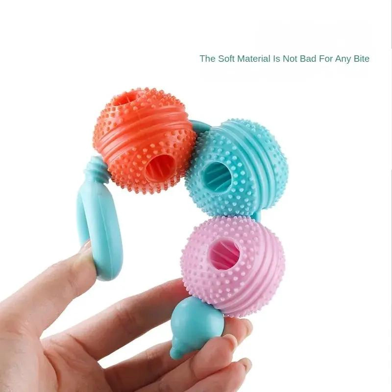 JUGUETE DISPENSADOR PARA MASCOTAS CON SUPERFICIE LIMPIA DIENTES - 3