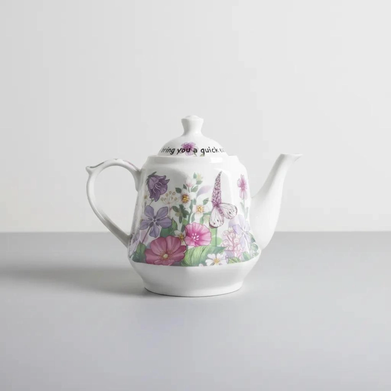 TETERA DE CERAMICA CON DISEÑO FLORAL COLORIDO Y ELEGANTE - 1