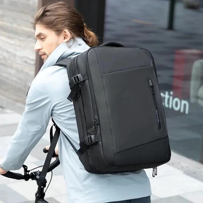 MOCHILA IMPERMEABLE ANTIRROBO EXPANSIBLE CON USB - 4