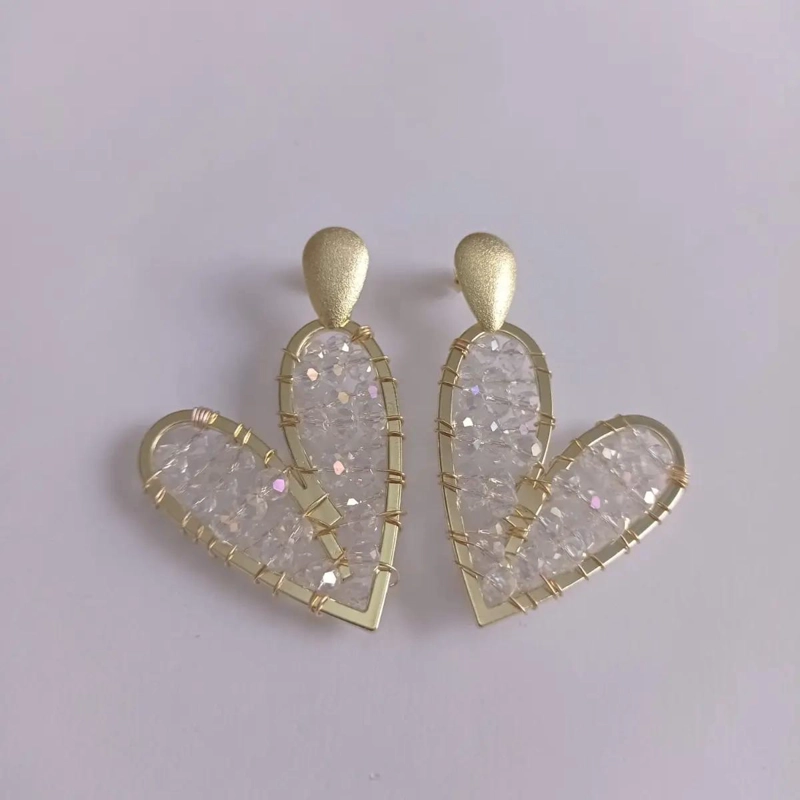 AROS MAXI CORAZONES CON PIEDRAS TRANSPARENTES EN BAÑO DE ORO - 4