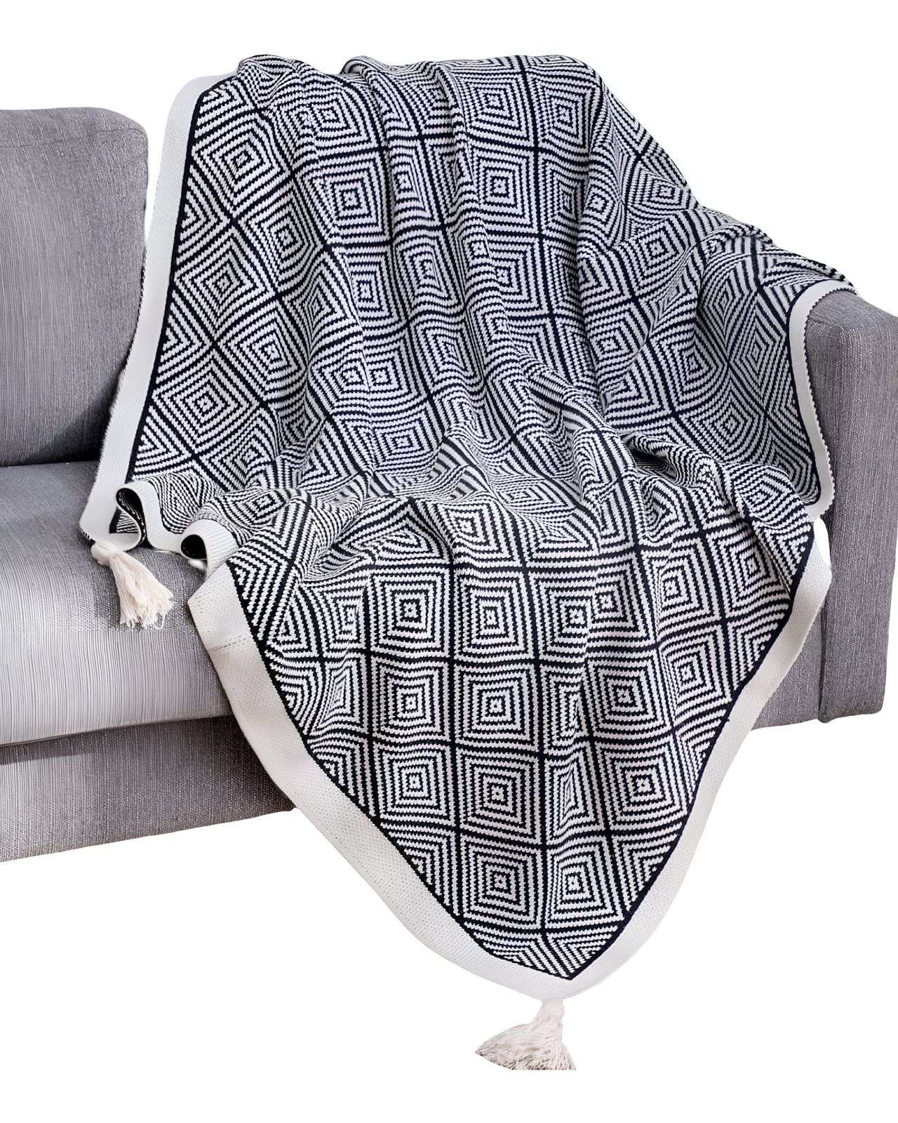 MANTA CON POMPON 130X150 CM NEGRO - 1
