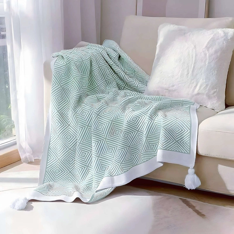 MANTA DECORATIVA CON ESTAMPADO Y BORLAS 130X150 CM M02 - 1