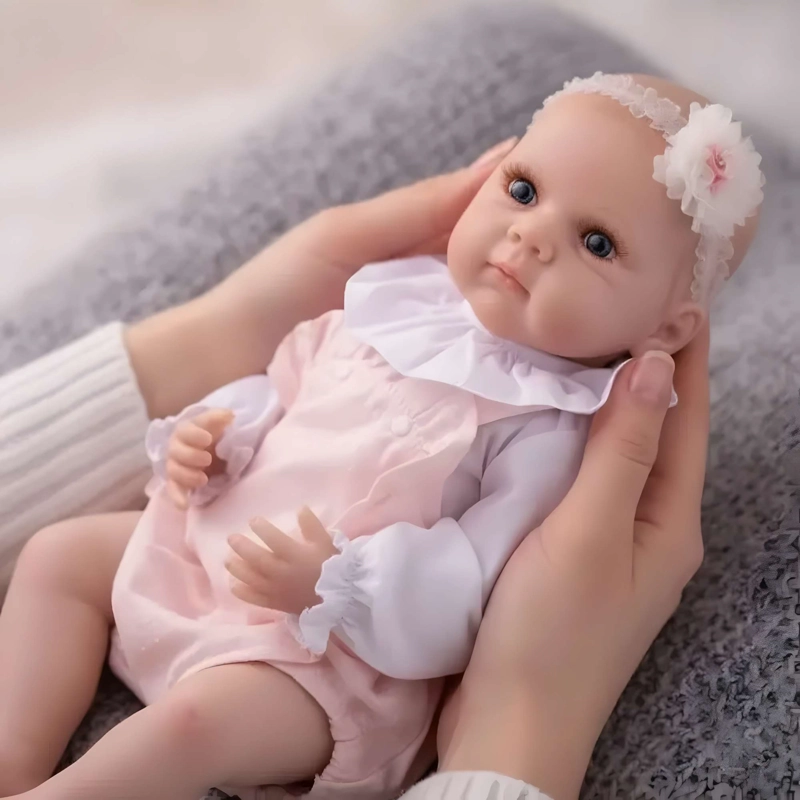 MUÑECA BEBE PELONA COLOR ROSADO 55CM - 1