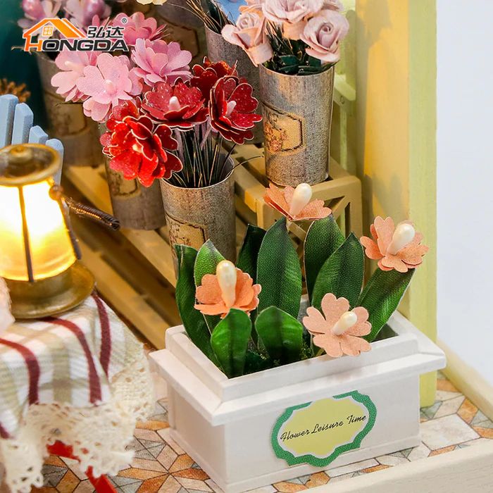 CASA MINIATURA DIY 'FLORERIA ENCANTADA' CON LUCES LED – KIT DE MADERA S2202 - 1