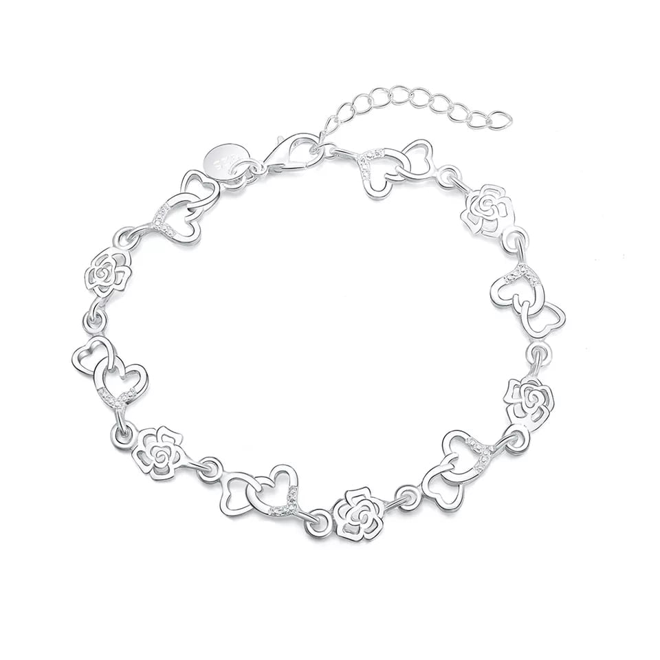PULSERA PLATEADA CORAZONES Y FLORES - 1