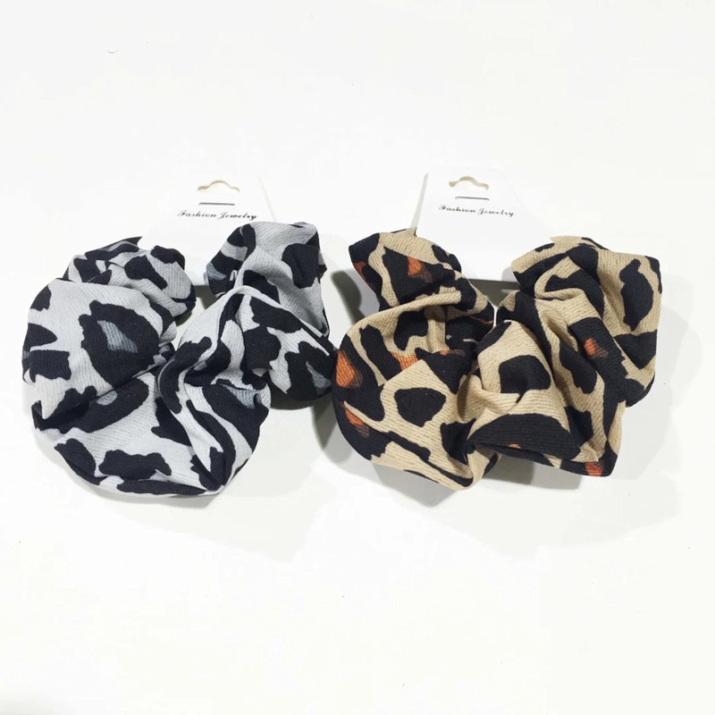 SET DE COLETEROS DE TELA CON ESTAMPADO ANIMAL PRINT EN TONOS BLANCO NEGRO Y CAFE  50072 - 1