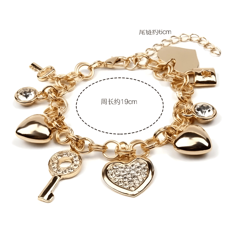 PULSERA ENAMORADOS + 9 COLGANTES BAÑO DE ORO 18KL.DE 19CM. - 1