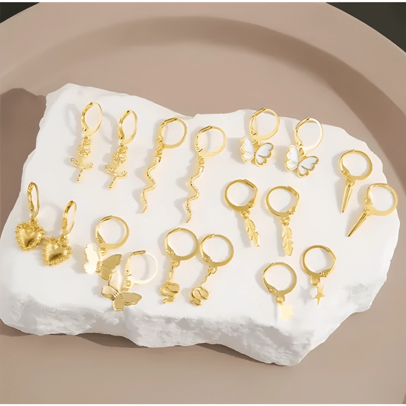 PACK DE 9 PARES DE AROS ARETES PENDIENTES DORADOS VARIADOS - 2