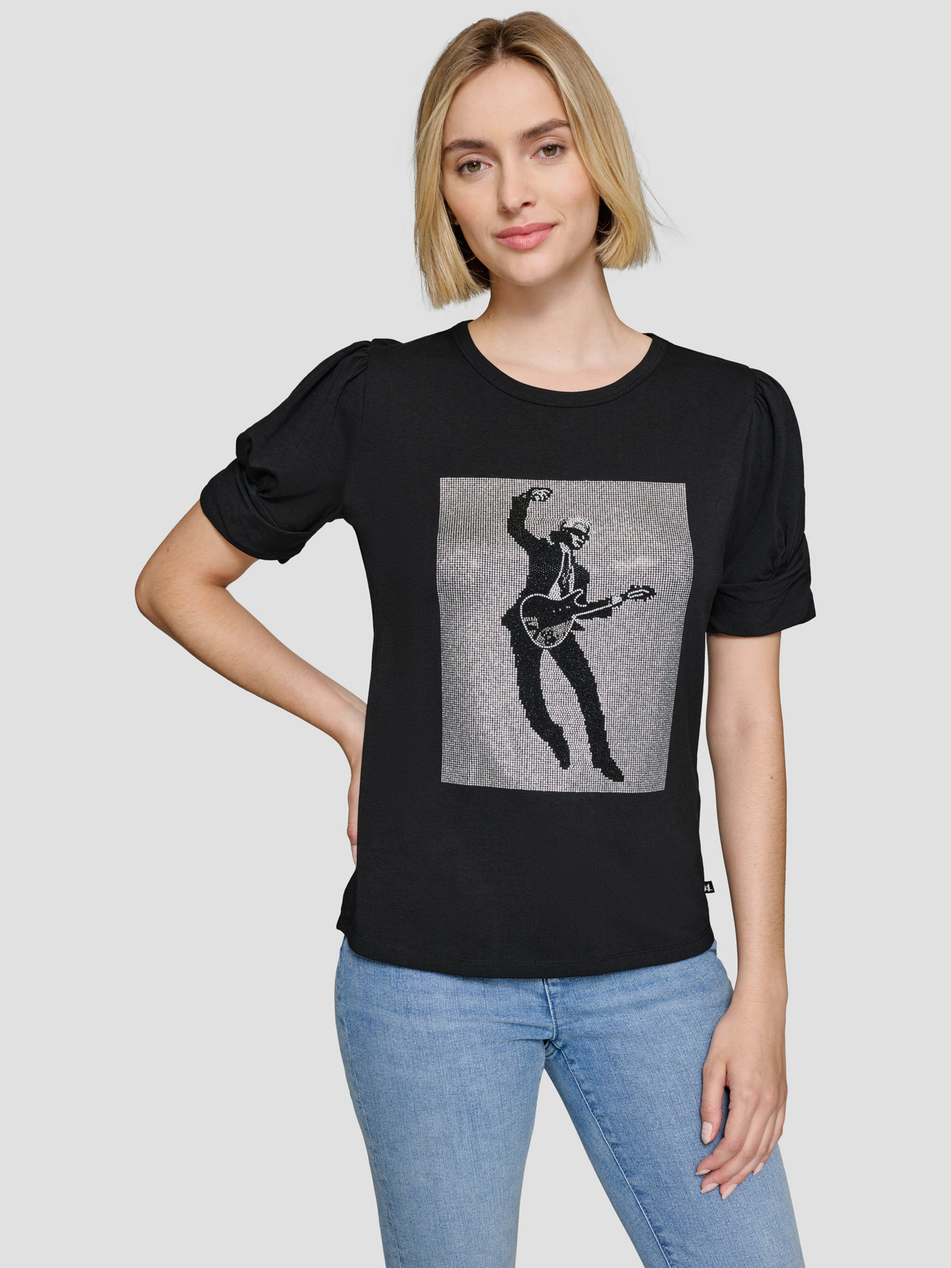 POLERA CON ADORNOS DE ESTRELLA - 1