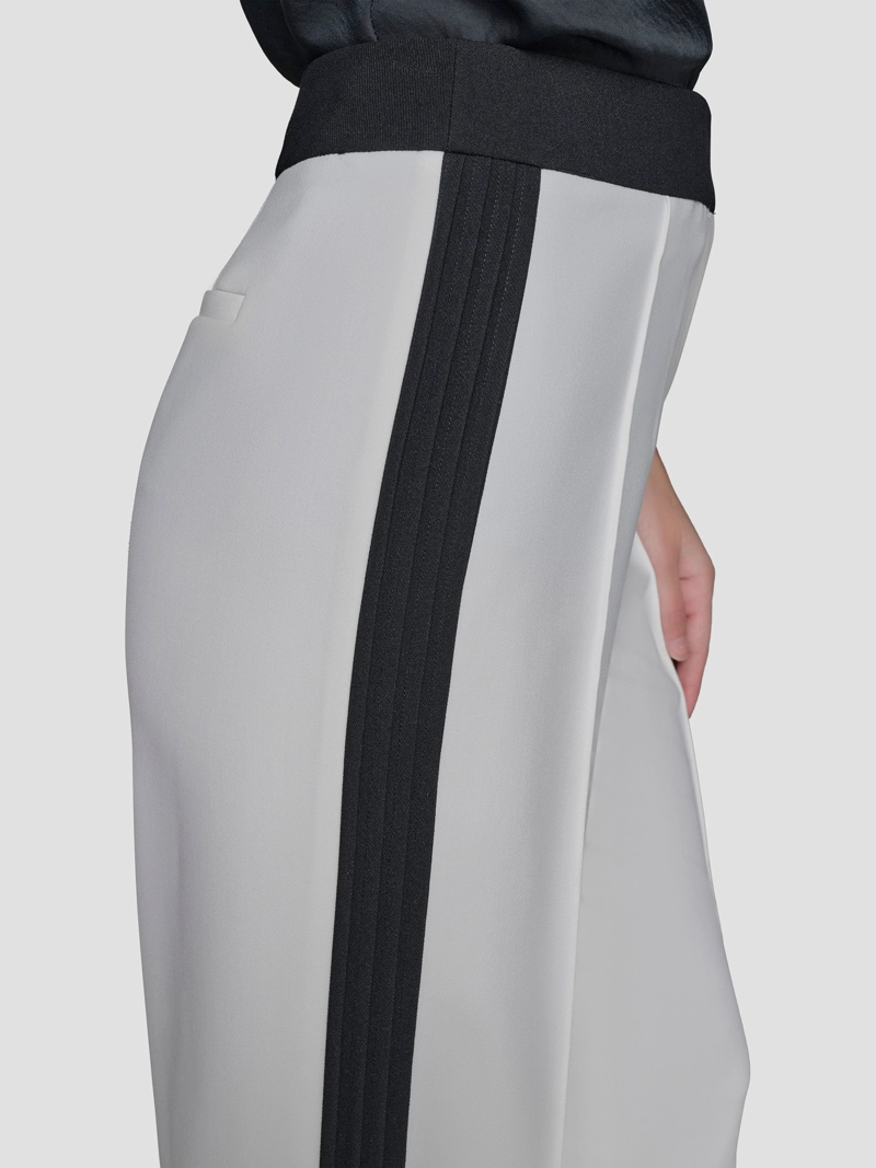 PANTALON CON PLIEGUES EN CONTRASTE - 6