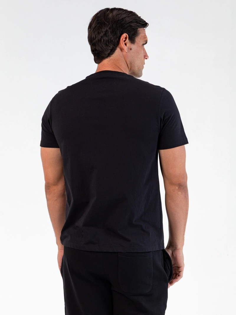 POLERA ESSENTIAL CON FIRMA BORDADA - 4