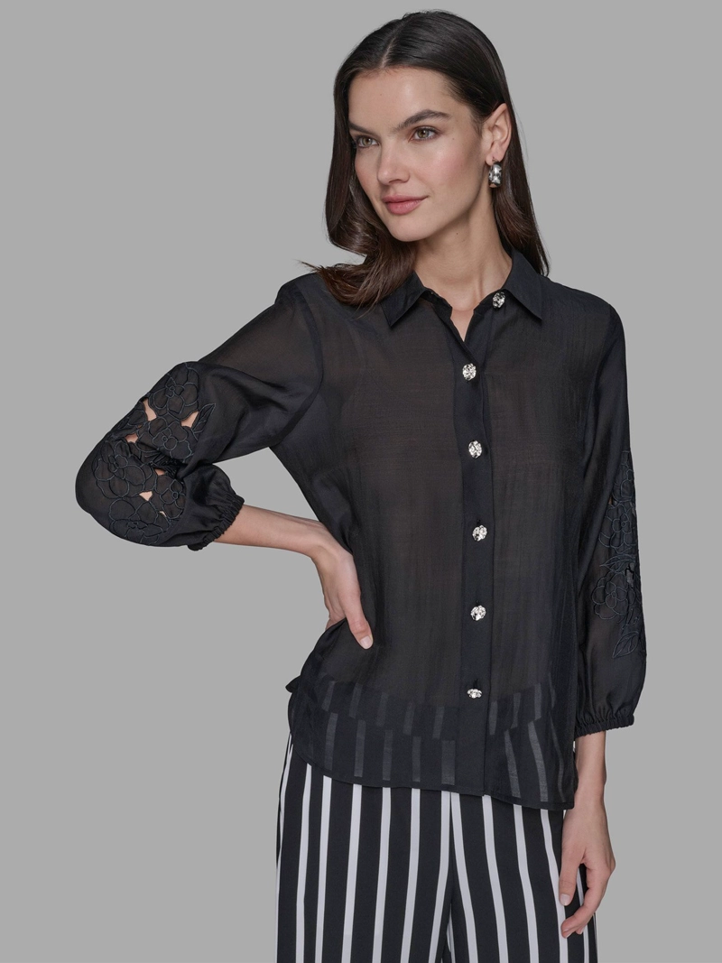 BLUSA CON MANGAS CALADAS Y DISEÑO FLORAL - 1