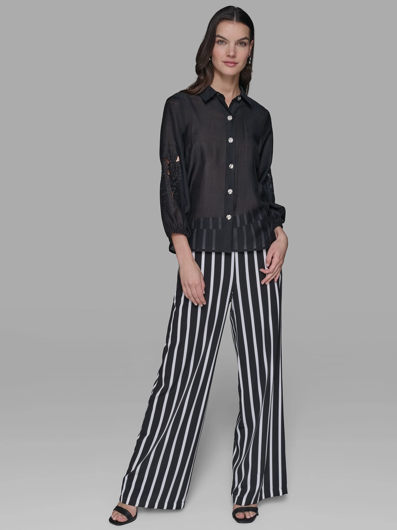 BLUSA CON MANGAS CALADAS Y DISEÑO FLORAL - 2