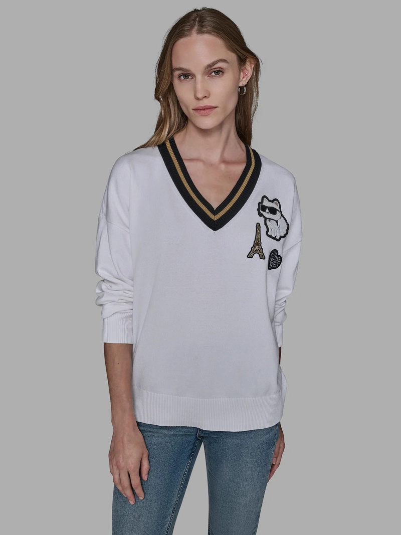 SWEATER VARSITY CON PARCHES DISTINTIVOS DE CHOUPETTE Y LA TORRE EIFFEL - 1