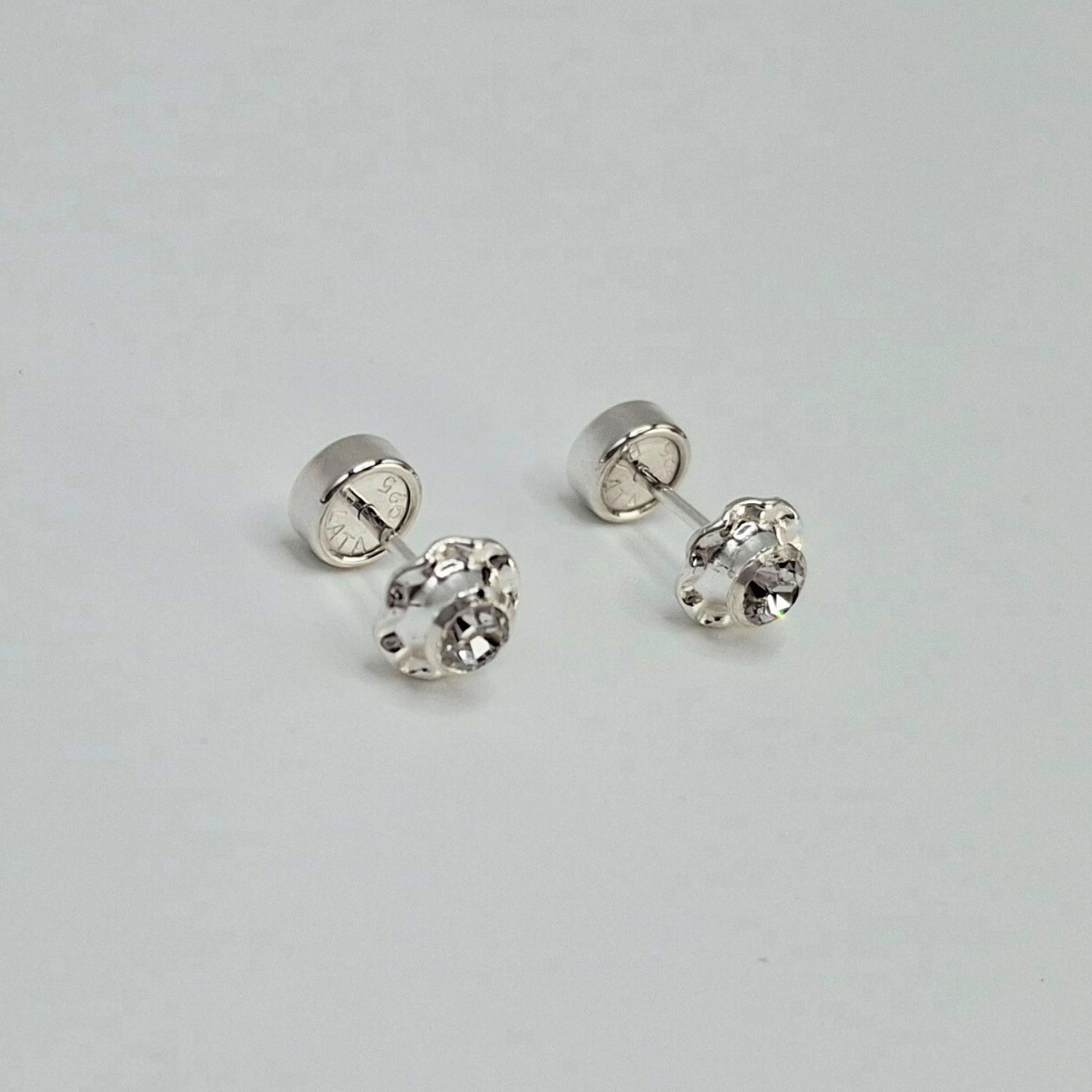 AROS ABRIDORES FLOR EN COLOR BLANCO DE CIRCÓN Y PLATA - 5
