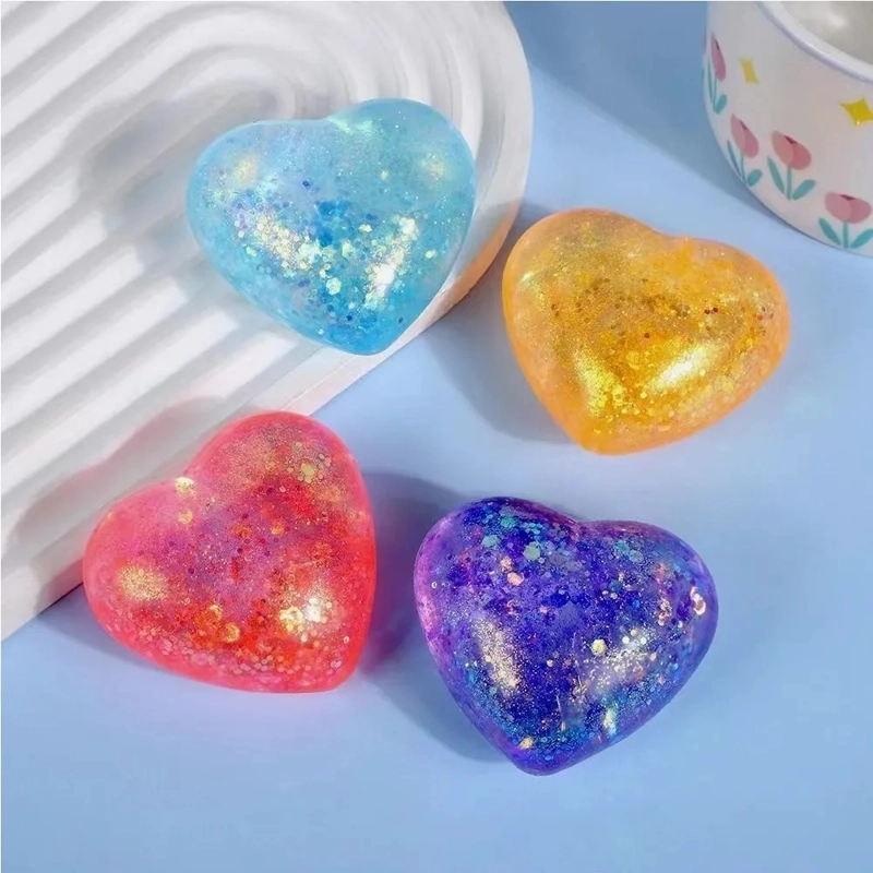SQUISHY DE CORAZON PURPURINA BRILLANTE DE GEL - 1