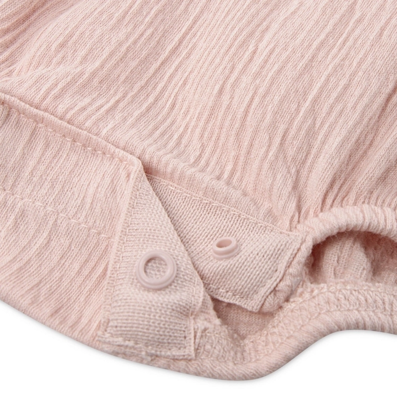 ENTERITO CORTO CON VOLANTES Y CINTILLO ROSADO BEBE HUGGIES - 4