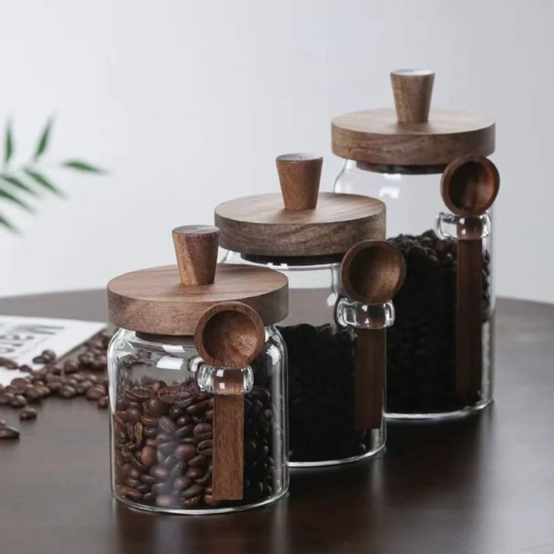 SET DE 3 FRASCOS DE VIDRIO CON TAPA DE MADERA Y CUCHARA - 1