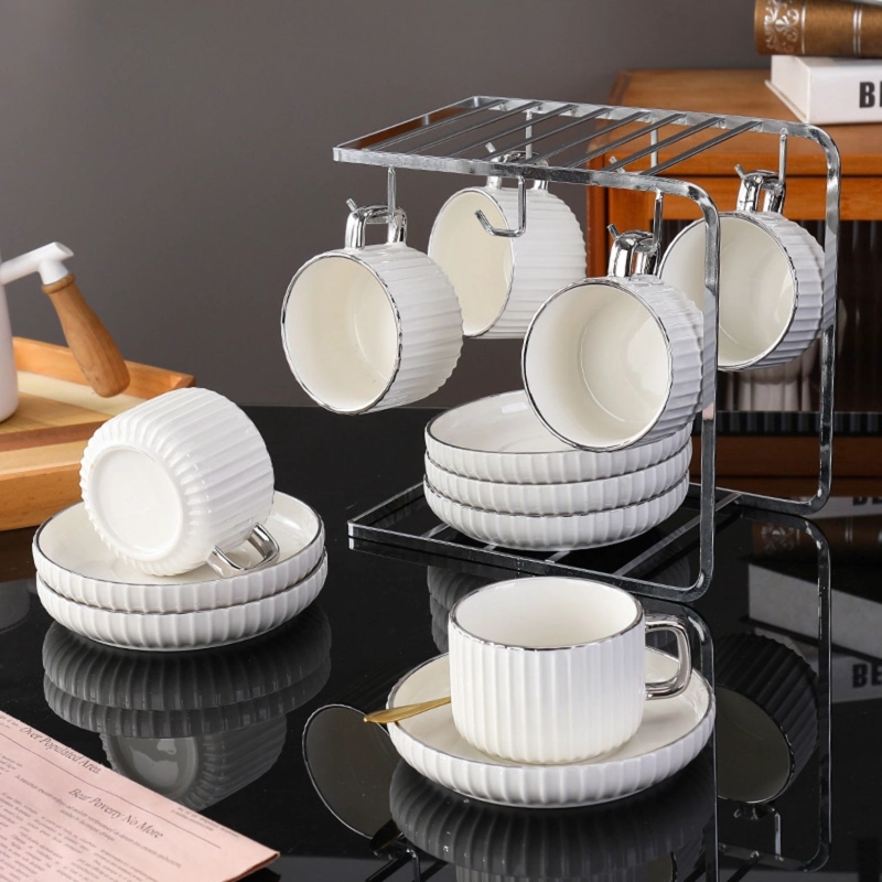 SET DE TAZAS Y PLATOS BLANCOS PARA TE  O CAFE  CON SOPORTE PLATEADO - 1