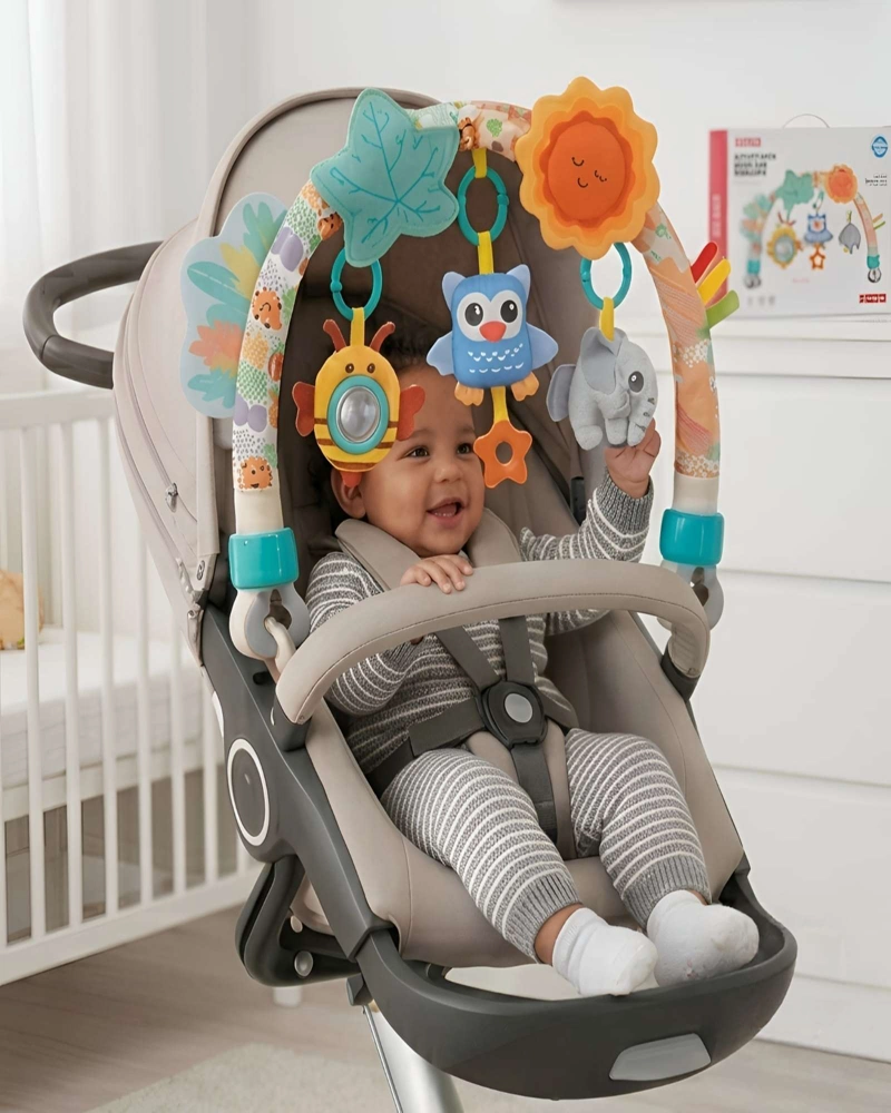 JUGUETE ESTIMULANTE PARA BEBE  - ARCO DE JUEGOS PARA COCHE O SILLA DE AUTO - 1
