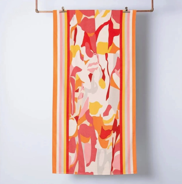 TOALLA DE ALGODON CON ESTAMPADO Y BOLSA - 1