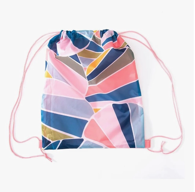 TOALLA DE ALGODON CON ESTAMPADO Y BOLSA - 3