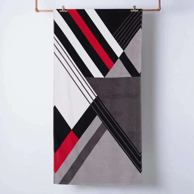 TOALLA DE ALGODON CON ESTAMPADO Y BOLSA - 1