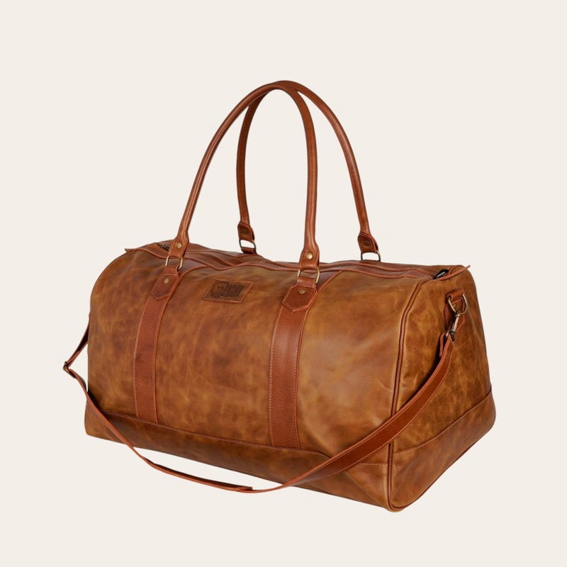 BOLSO DE VIAJE EN CUERO NATURAL FUTALEUFU OLKI - CAFE  APLICACION - 1