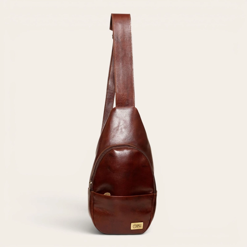 BANDOLERA SLING BAG DE CUERO NATURAL CUNCO OLKI - CASTAÑO - 1
