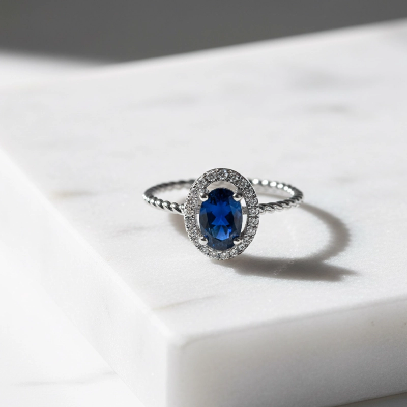 ANILLO ZAFIRO AZUL ENTRELAZADO CON HALO #10 - 2