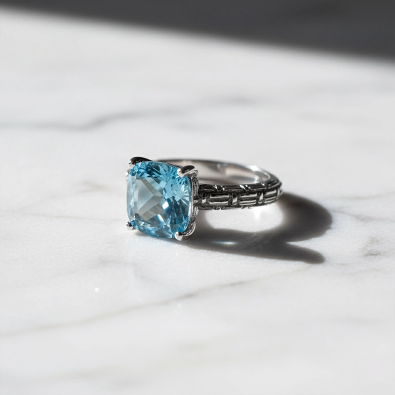 ANILLO TOPACIO AZUL FACETADO EN GRIFAS #14 - 2