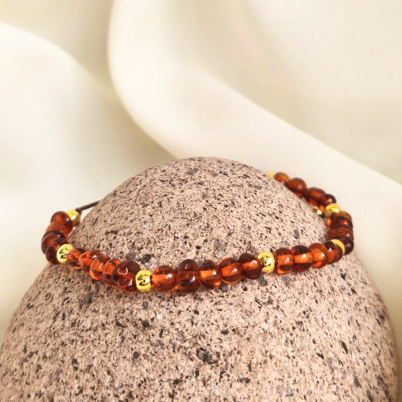 PULSERA DE AMBAR CON BALINES BAÑADOS DE ORO - 1