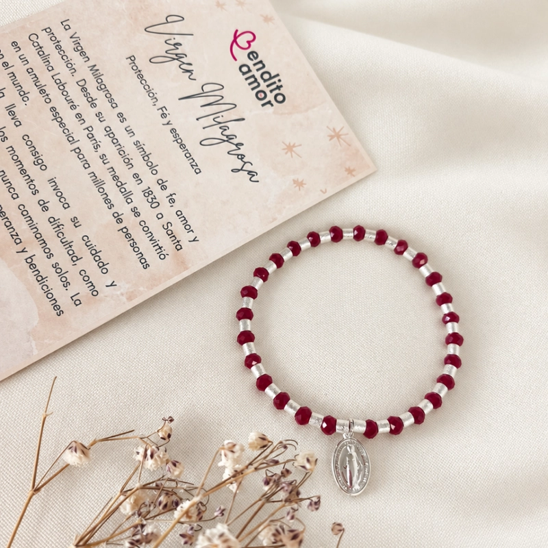 PULSERA ELASTICADA DE CRISTALES ROJOS Y MOSTACILLAS DE PLATA CON MEDALLA VIRGEN MILAGROSA - 1
