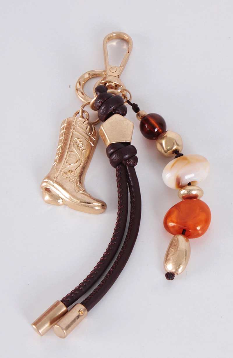 CHARM BOTA Y PIEDRAS - 1
