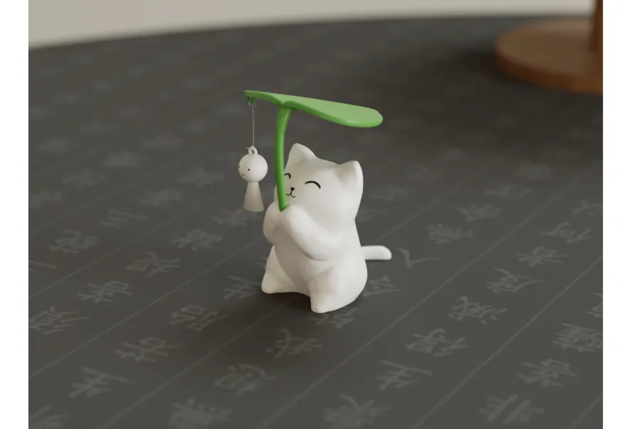 FIGURA DECORATIVA GATITO SOSTENIENDO UNA HOJA - 1