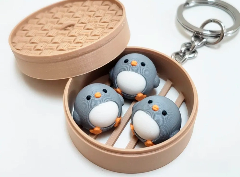 LLAVERO DE PANECILLOS DE PINGUINO - 1