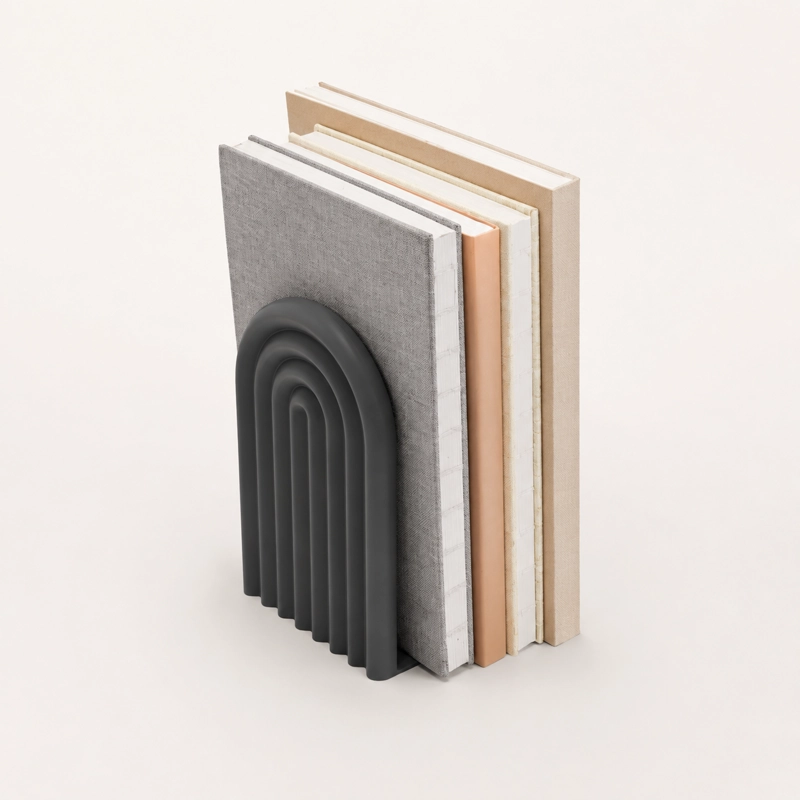 FIGURA DECORATIVA DE SUJETA LIBROS DE ARCO MODERNO - 3