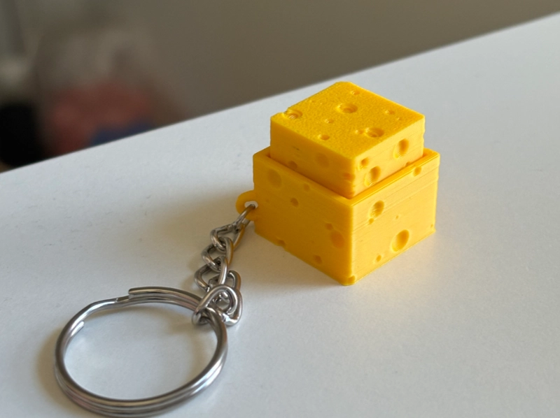 LLAVERO CLICKER DE QUESO - 1