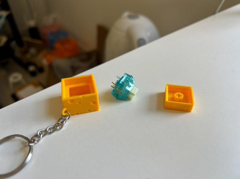LLAVERO CLICKER DE QUESO - 2