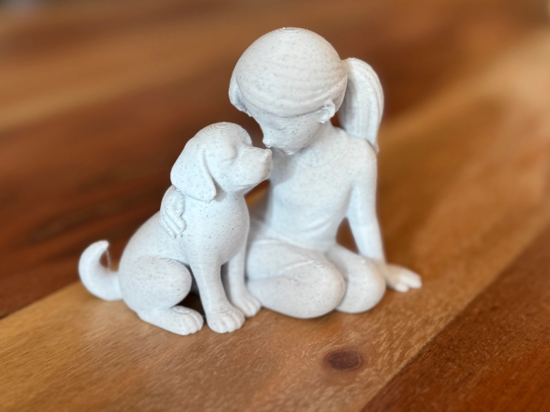 ESCULTURA DECORATIVA- LAZO DE NIÑA Y PERRO - 1