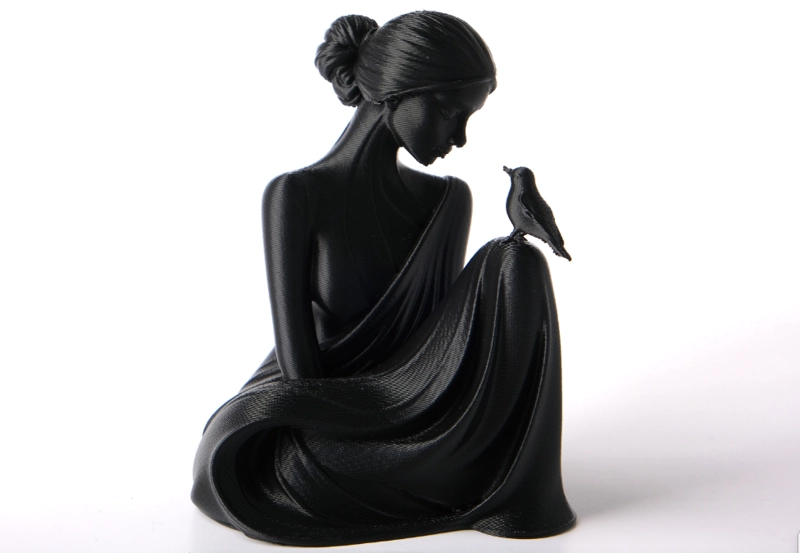 ESCULTURA DECORATIVA- DAMA Y PAJARITO - 1