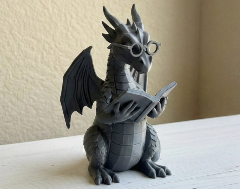 ESCULTURA DECORATIVA- DRAGON LECTOR - 1